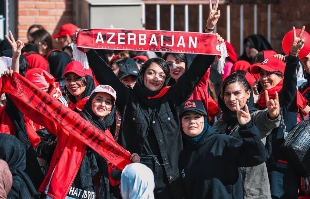 Police prevent women from entering the stadium