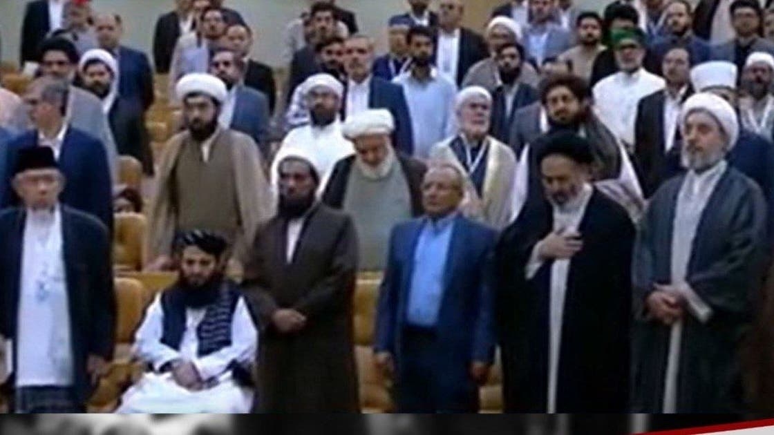 نایستادن نماینده طالبان هنگام پخش سرود ایران