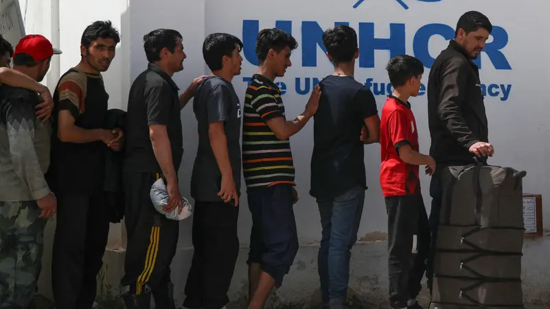 UN migration agency: Nearly 450,000 Afghans left Iran since June